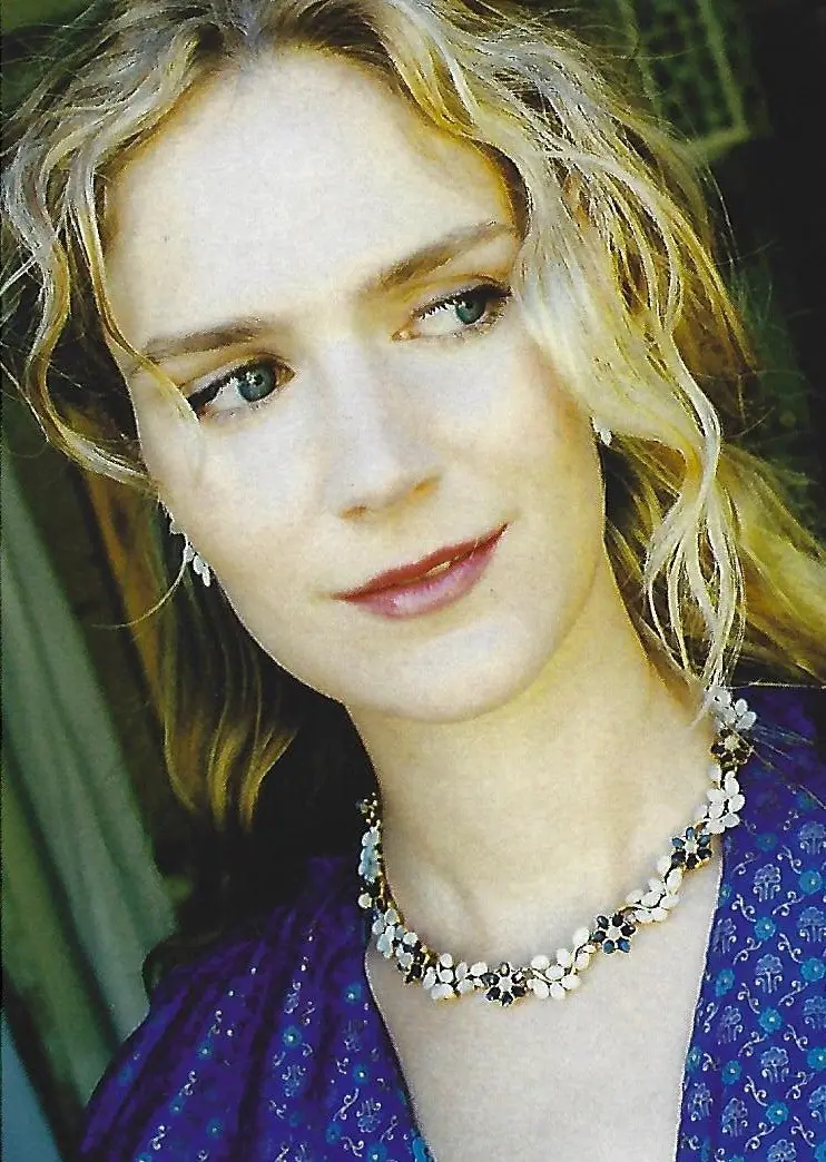 Model wearing a Swoboda sapphire and opal flower necklace